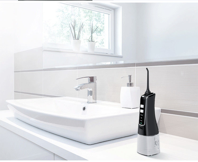 Nicefeel FC256 เครื่องชลประทานในช่องปาก Flosser น้ำไร้สายแบบพกพา 300ml Tank